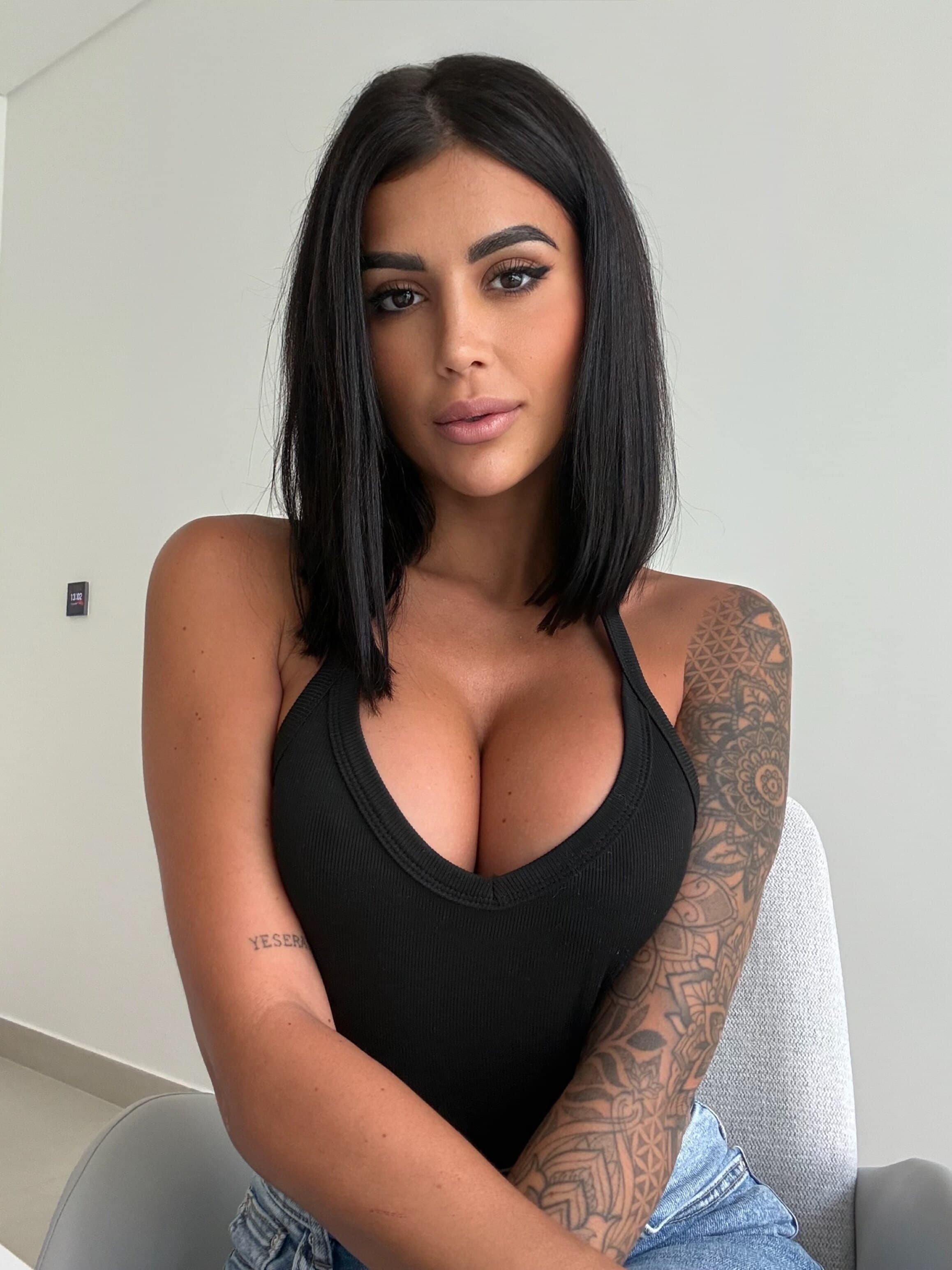 GINA AMIRA